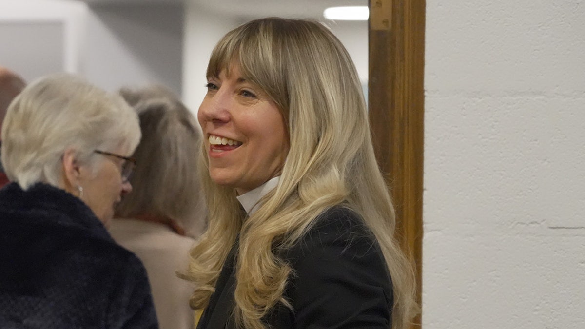 Campaigner Sarah Trone Garriott faces backlash after revealing she officiated a satanic wedding.