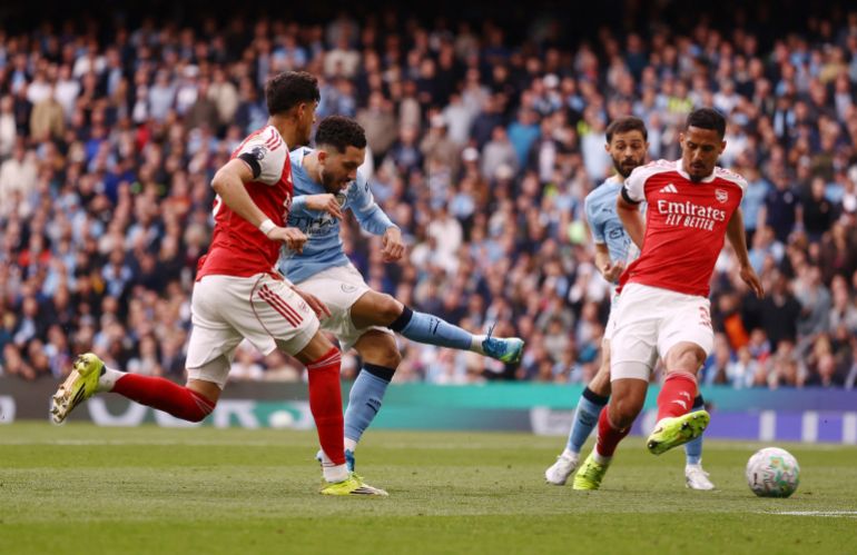 Haaland strike leaves Arsenal three points adrift with one game left.