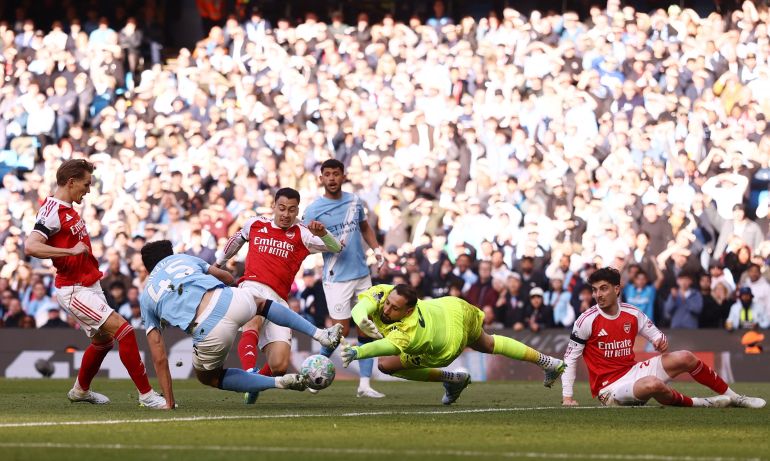 Haaland strike leaves Arsenal three points adrift with one game left.