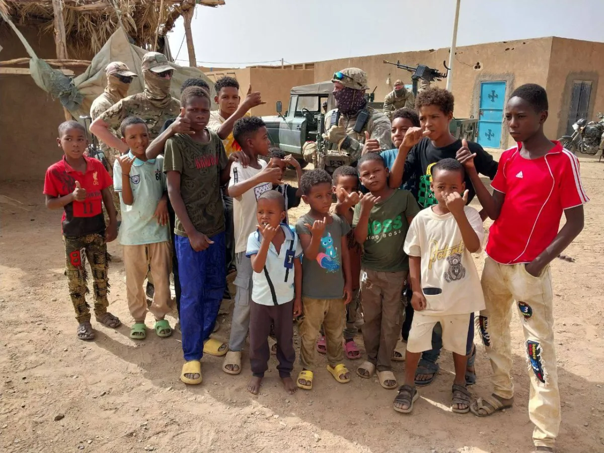 Russia's elite troops hold Mali's capital as insurgents threaten regime survival.